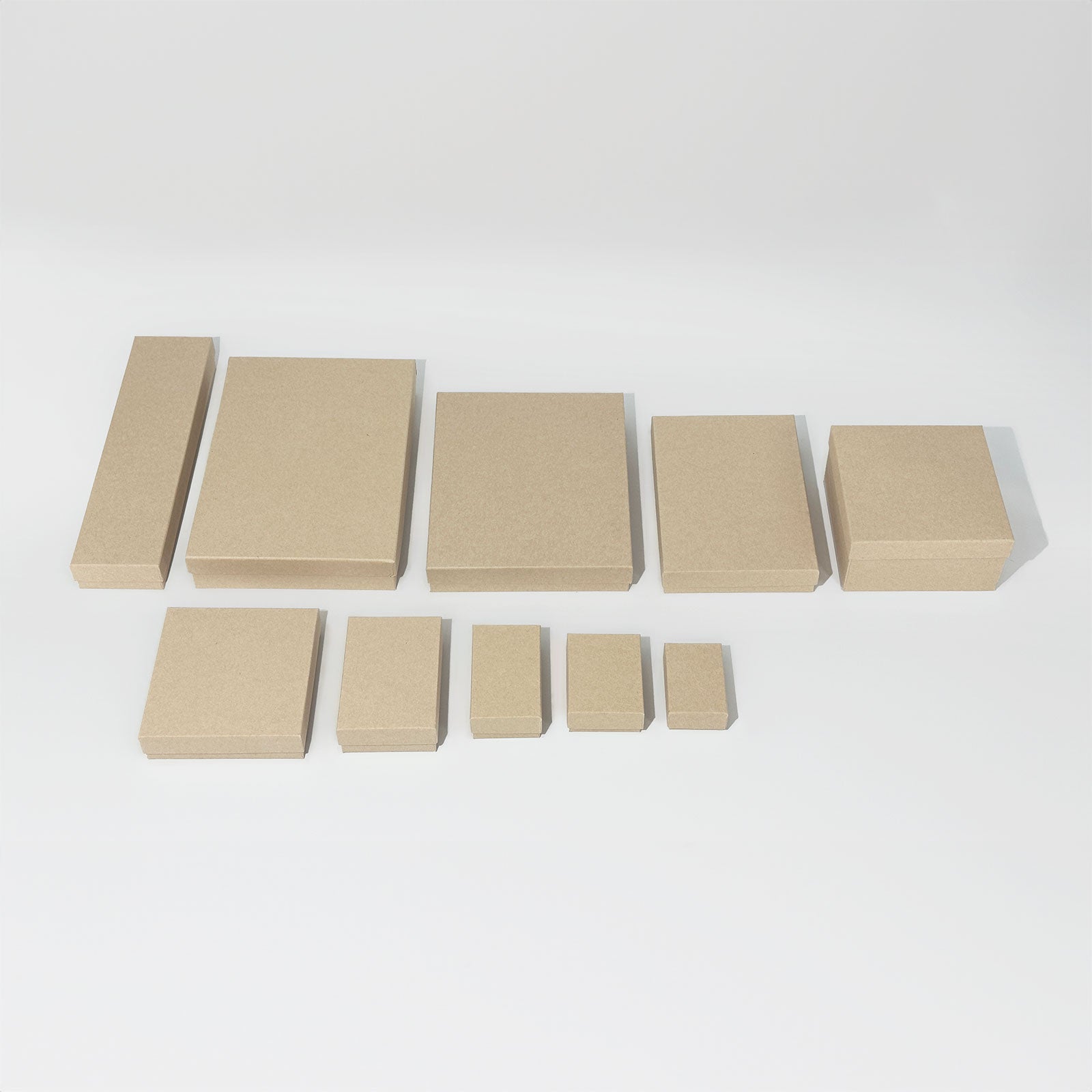 100- Kraft Boxes filled with cotton 7-1/8