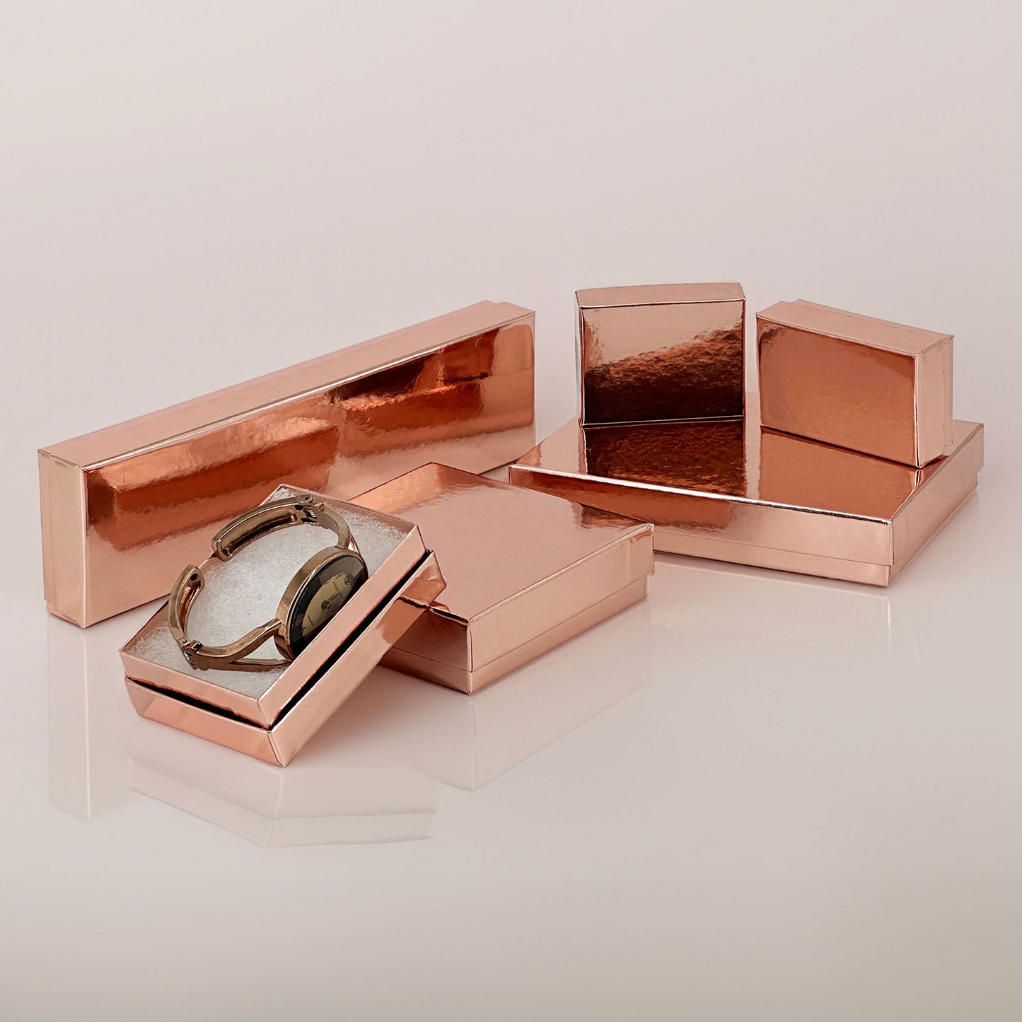 3 1/2" x 3 1/2" x 1" Metallic Rose Gold Cotton Filled Paper Box